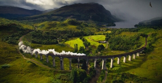 Aerial Shots Of Old Steam Engine In Beautiful Countryside